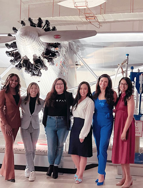 Justina with a group at an engineering event